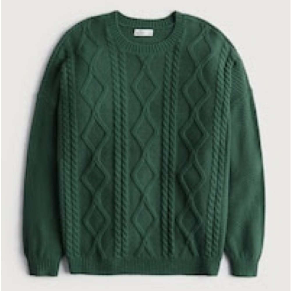 green argyle-like sweater
